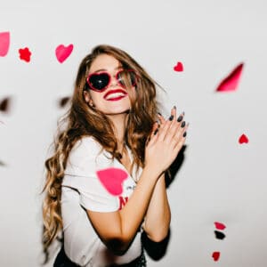 Easy-going,Girl,With,Long,Hair,Expressing,Positive,Emotions,In,Valentine’s